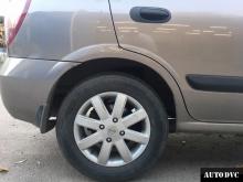 Задняя часть Nissan Almera после установки проставок