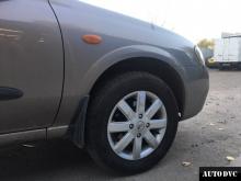 Передняя часть Nissan Almera после установки проставок