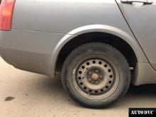 Задняя часть Nissan Primera III после установки проставок