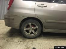 Задняя часть Suzuki Liana после установки проставок
